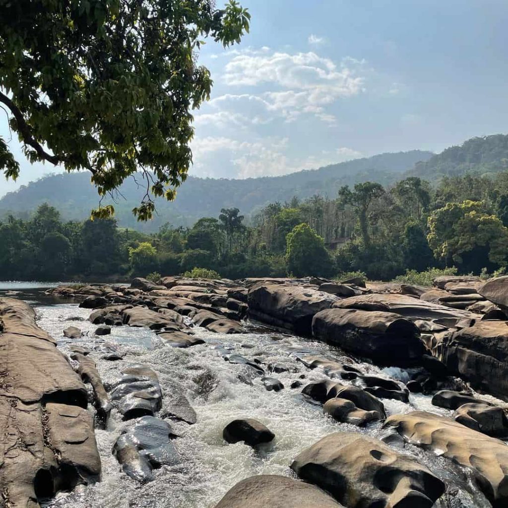 Amba Teertha is notable for its crystal-clear water near RiverMist Resorts Chikmagalur