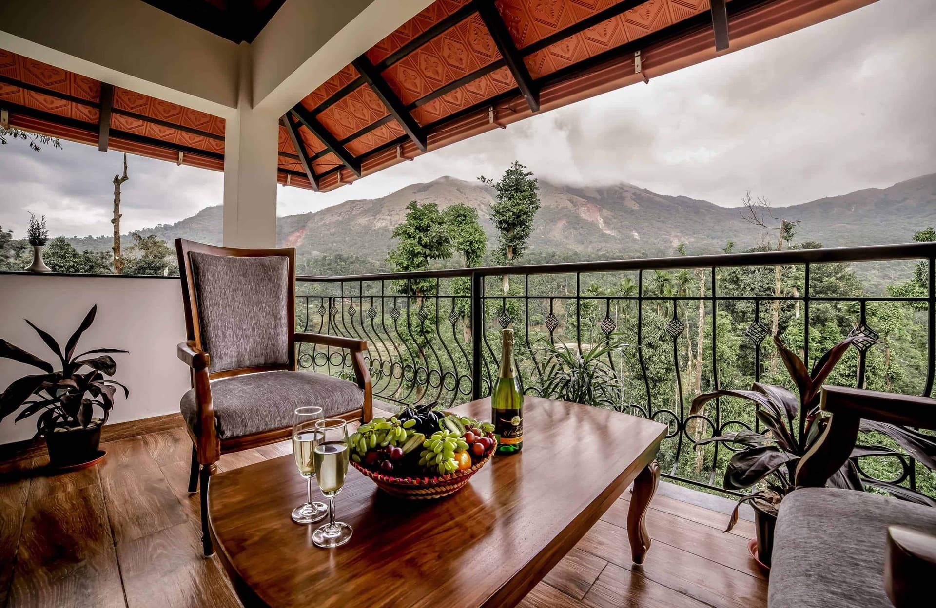 Luxury balcony with fruit, champagne, and view. RiverMist.
