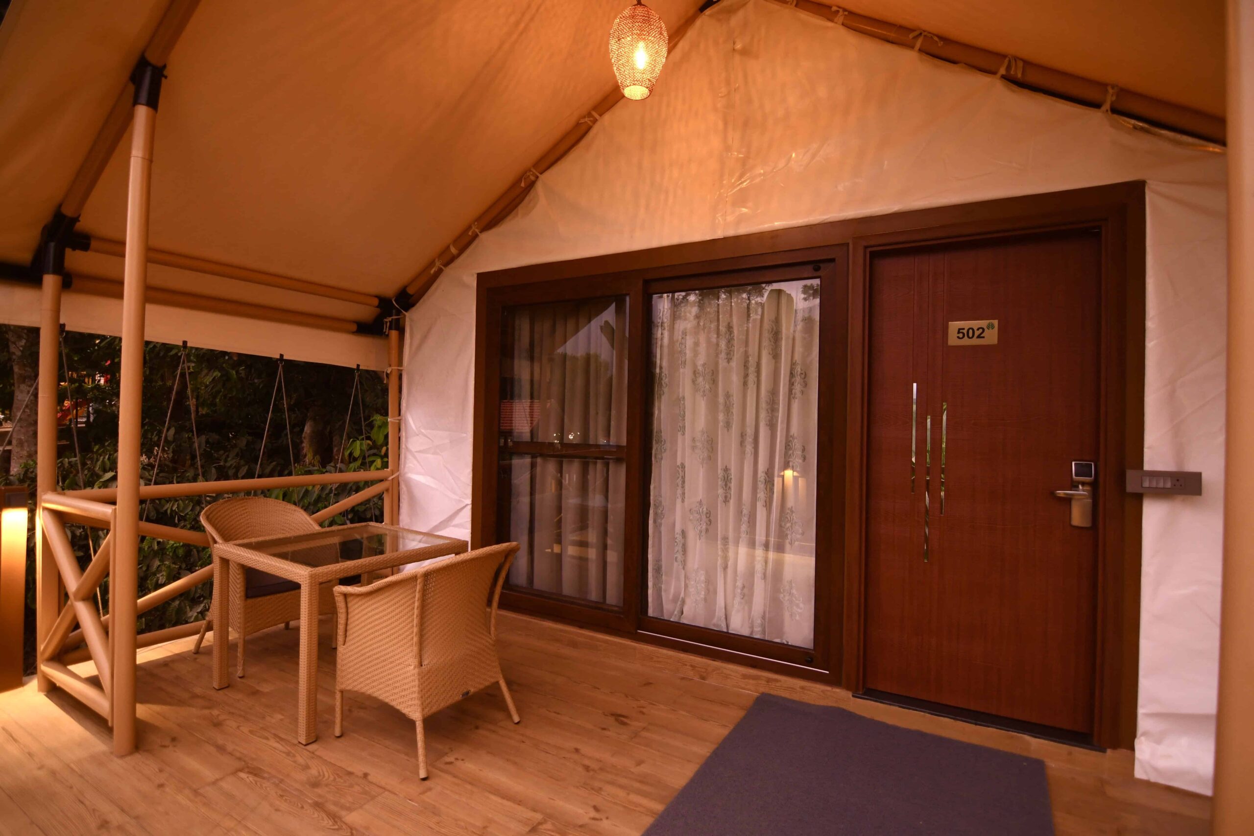 Exterior of luxury pavilion deck and seating. RiverMist Resorts.