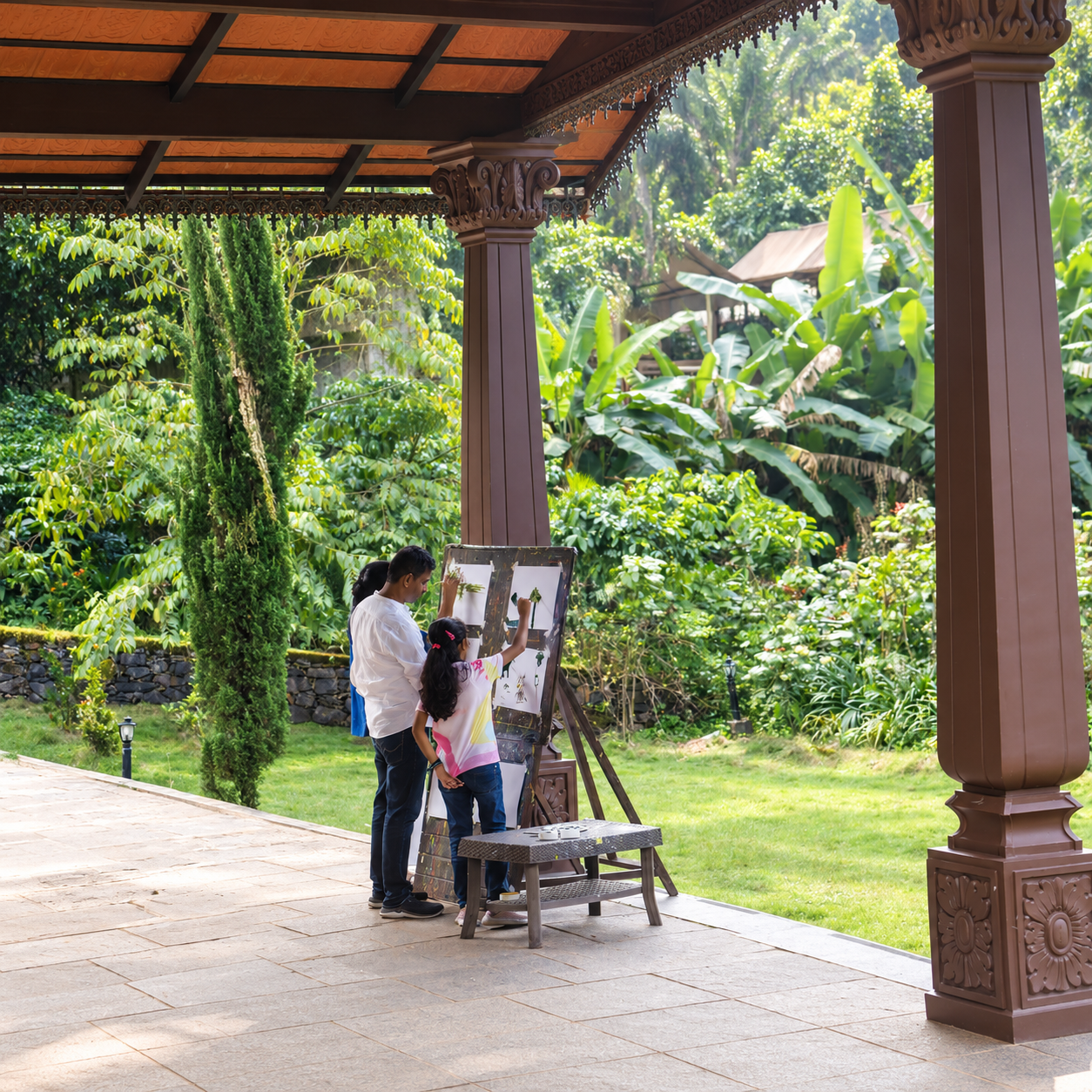 Painting amidst Nature nature activity board beneath a RiverMist garden pavilion